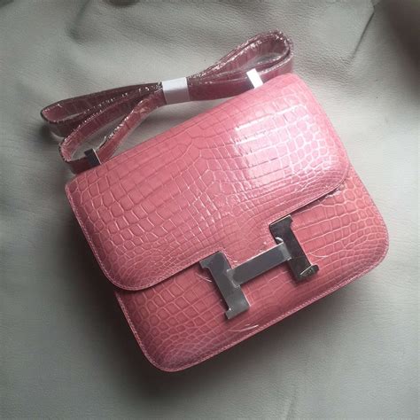 hermes peach cape w leather croc trim|Hermes leather for sale.